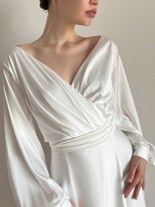 Robe de mariée à manches évêques