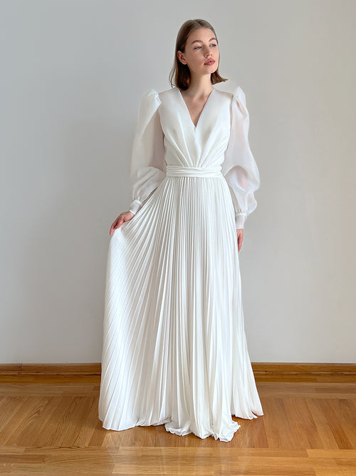 Elegant white pleated wedding dress with long organza sleeves and deep V-neckline