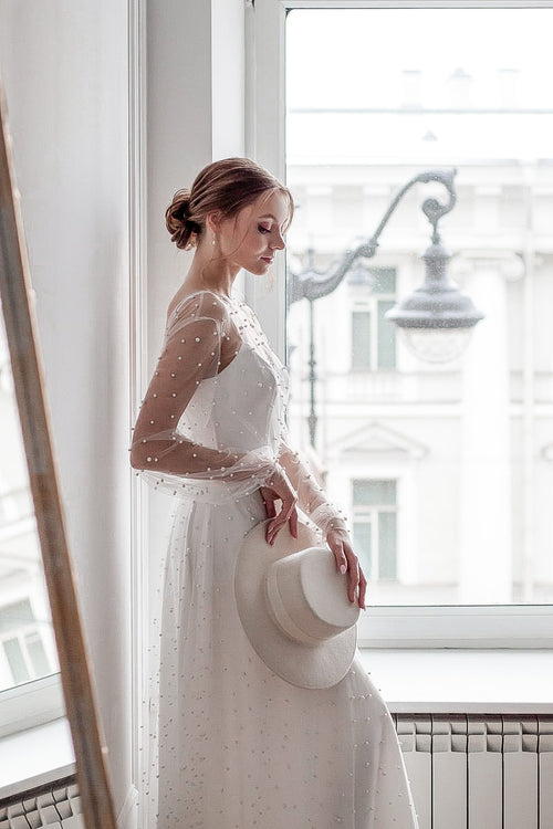Robe de mariée perlée