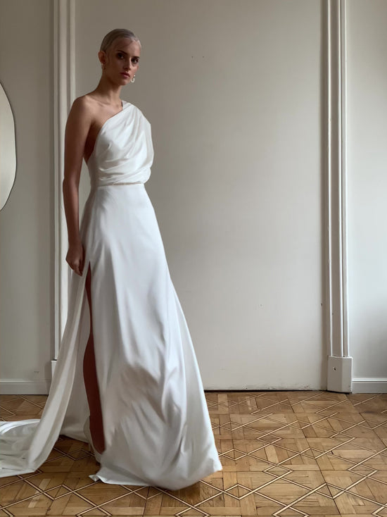 One_shoulder_wedding_dress_slit_skirt